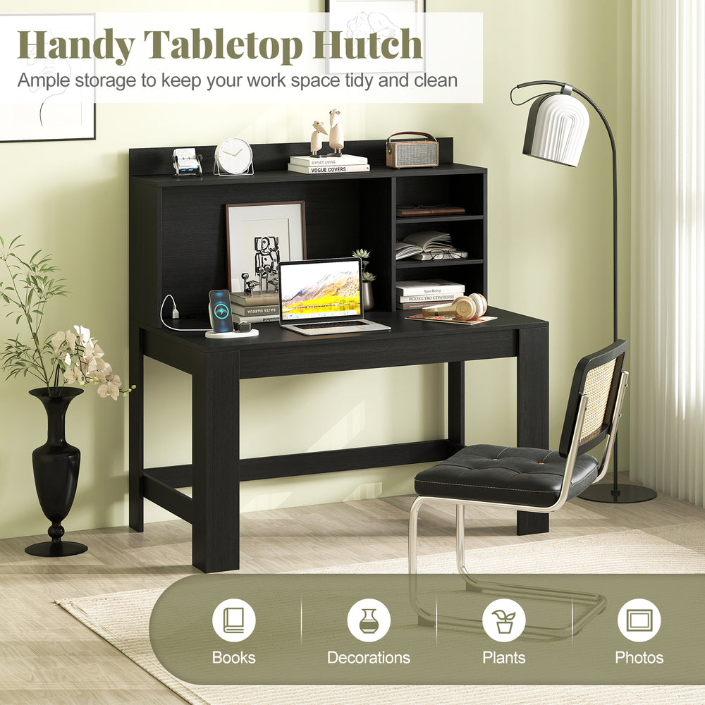 Modern black computer desk with hutch, showcasing a raised display shelf and ample storage for plants and albums.