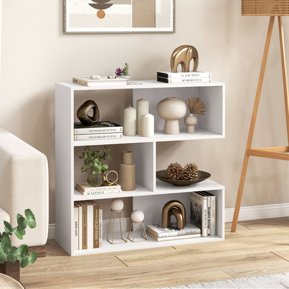 Concave bookshelf in white showcases three open shelves with a protective baffle, perfect for displaying decorative items.
