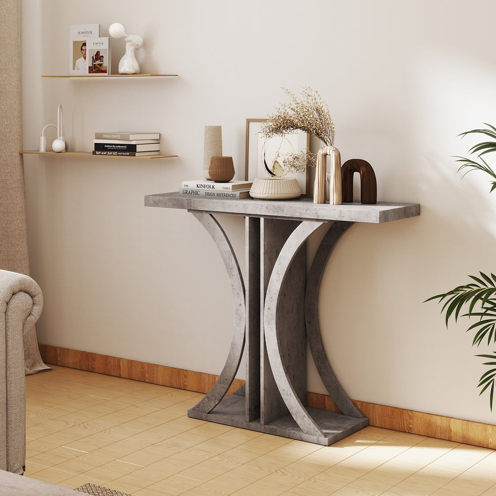 Gray console table with geometric frame, offering ample storage for decor in living room or entryway.