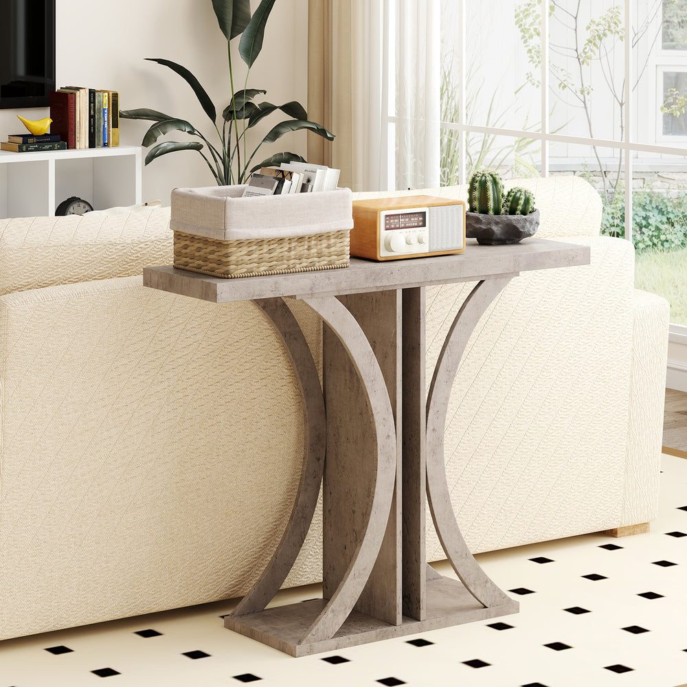 Gray console table with geometric frame, offering ample storage for decor, suitable for living room or entryway.