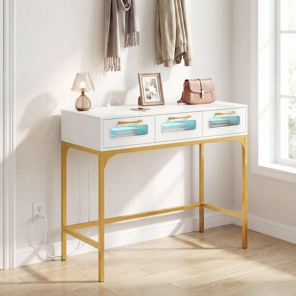White console table with LED lighting and charging station, featuring gold legs, ideal for living room or hallway use.