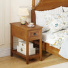 Compact yellow chairside end table with drawer and shelf, perfect for bedroom or living room storage and decor.