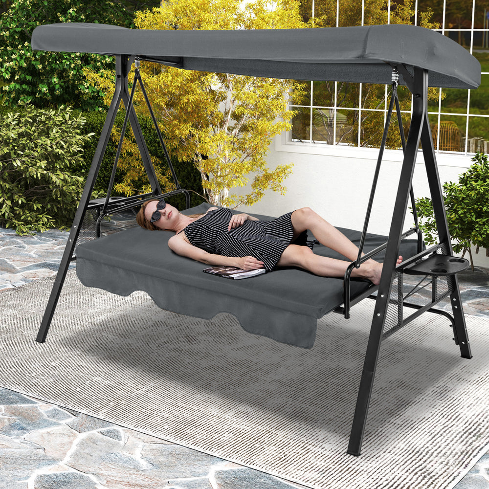 Convertible 3-seat patio swing chair in gray, featuring adjustable canopy and cushions, perfect for backyard relaxation.