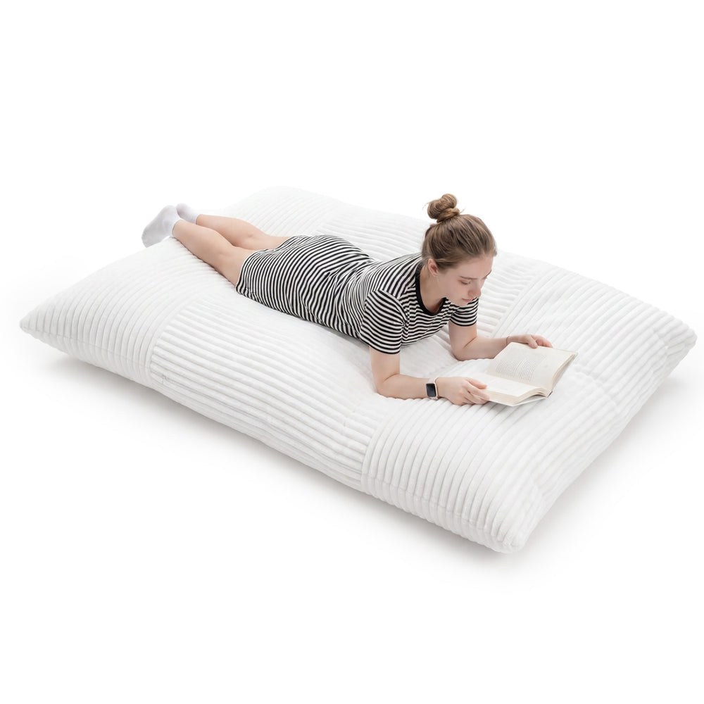 Convertible bean bag floor sofa in beige with corduroy cover, ideal for reading, gaming, or quick naps.