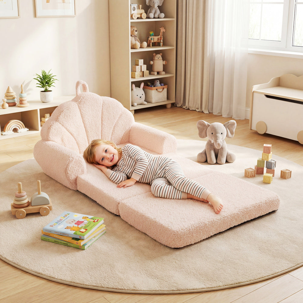 Convertible kids sofa in beige, featuring soft teddy fleece, used as a lounge bed for reading and relaxing.