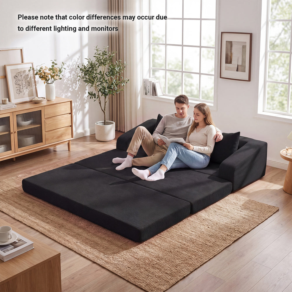 Corduroy loveseat sleeper sofa in black with two back cushions, easily converts for relaxing, reading, or resting.