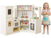 Corner kids play kitchen in beige with stoves, oven, and interactive features for immersive culinary role-play.