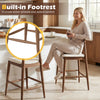 Counter height bar stool with curved back, built-in footrest, and solid walnut wood for kitchen island comfort.