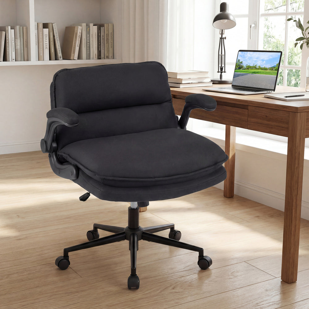Gray Criss Cross chair on wheels with flip-up arms, adjustable height, and overstuffed backrest for home office comfort.