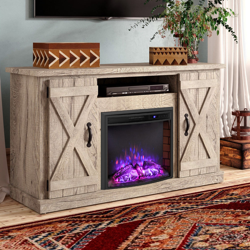 Curved recessed electric fireplace insert in rustic design, enhancing cozy ambiance and warmth in small spaces.