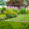 Decorative black garden fence with 5 panels and stakes, ideal for flower beds and pet containment in outdoor spaces.
