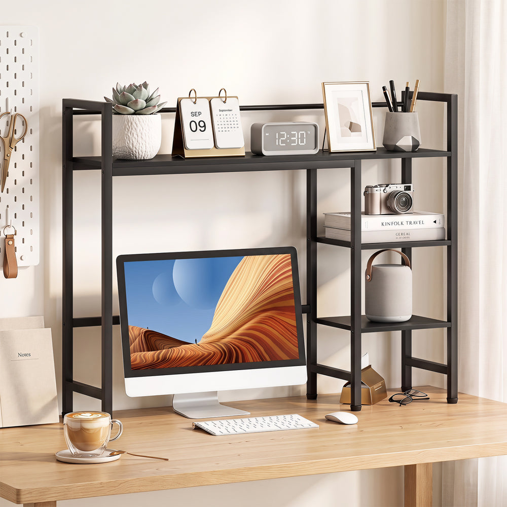 Desktop bookshelf with four open shelves and sturdy black metal frame, ideal for home office organization and monitor display.