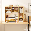 Desktop bookshelf in yellow with 7 open cubbies and 3 adjustable shelves, perfect for organizing a computer desk.