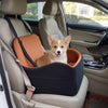 Elevated dog booster car seat in black and orange, featuring safety leash and removable cushion for secure pet travel.