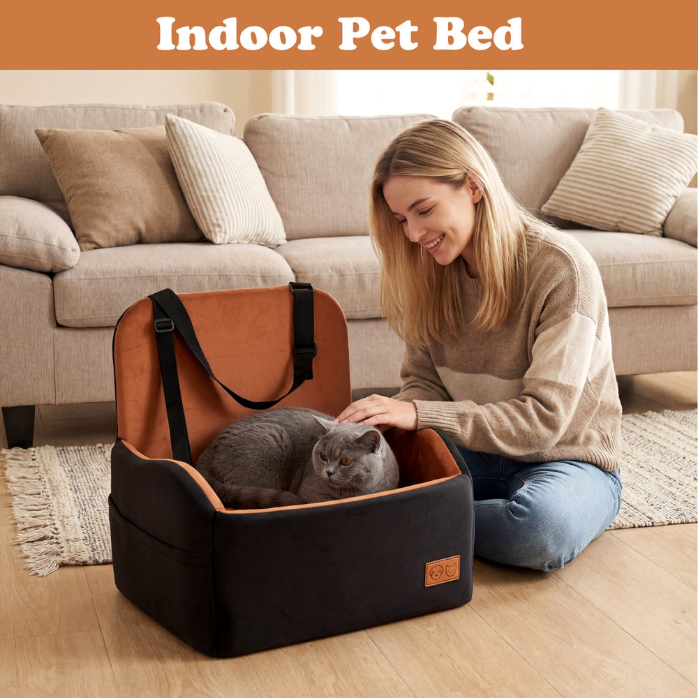 Detachable dog booster car seat in indoor pet bed style, featuring soft plush fabric and adjustable safety strap.