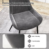 Gray dining chair with premium velvet fabric covering, featuring metal legs for modern elegance and comfort.