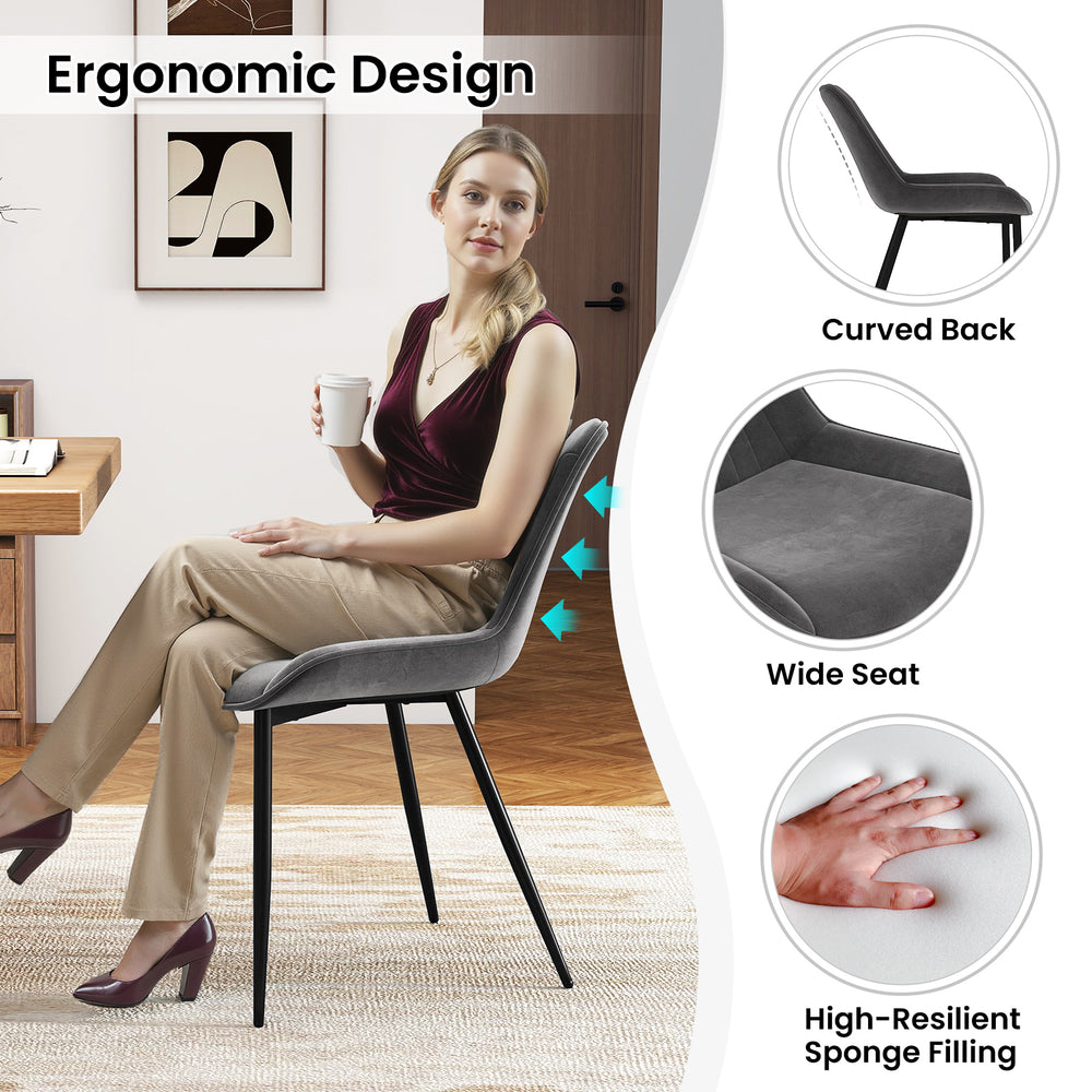 Gray dining chair with ergonomic curved back and wide seat, upholstered in faux leather for modern kitchen decor.