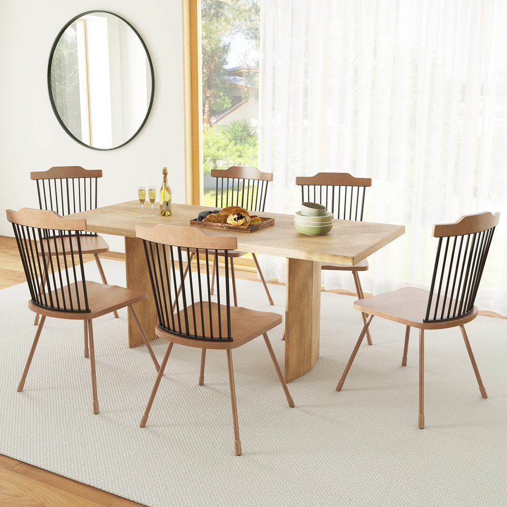 Set of two dining chairs with spindle back and ergonomic contoured seat in natural wood finish for stylish dining.