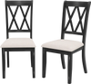 Set of 2 dining chairs with curved cross back, rubber wood legs, and beige upholstered seats for kitchen or dining room.