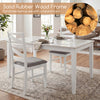 Set of 4 white dining chairs with rubber wood frames and breathable linen upholstery for kitchen or dining room use.