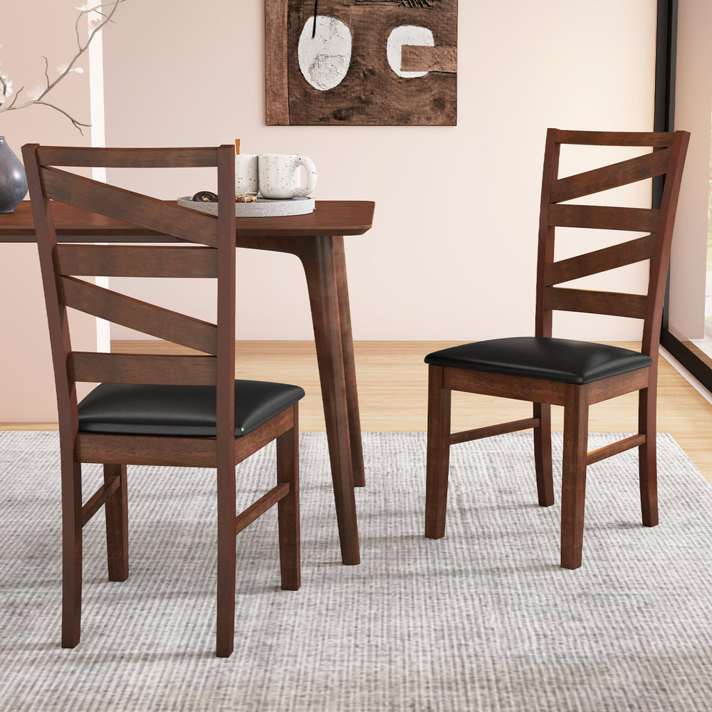 Set of 2 walnut dining chairs with rubber wood legs and PU leather upholstery, perfect for enhancing your kitchen space.