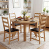 Farmhouse dining room chairs set of 2 with hollowed backrest and PU leather cushions, perfect for cozy dining spaces.