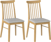 Set of 2 natural rubber wood dining chairs with fabric upholstery and spindle backrest for stylish kitchen seating.