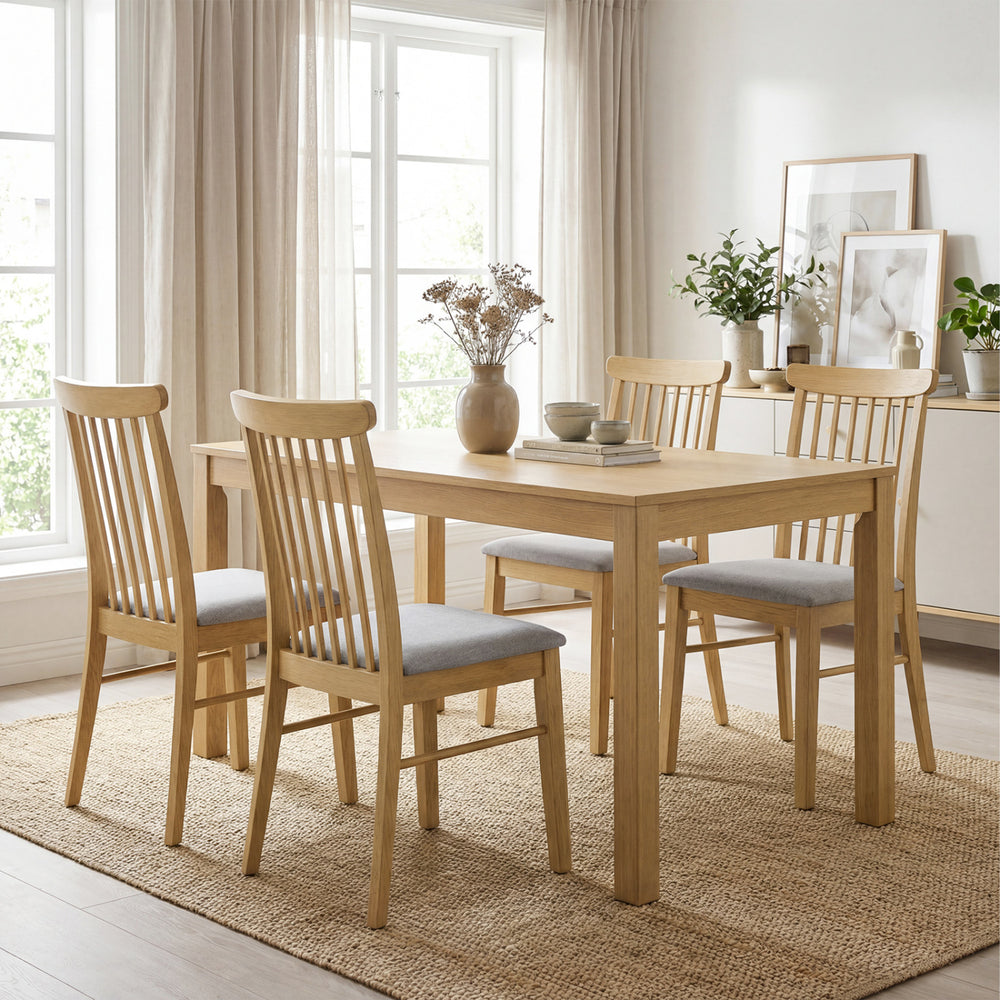 Natural rubber wood dining chairs with fabric upholstery and spindle backrest, ideal for kitchen or dining room use.