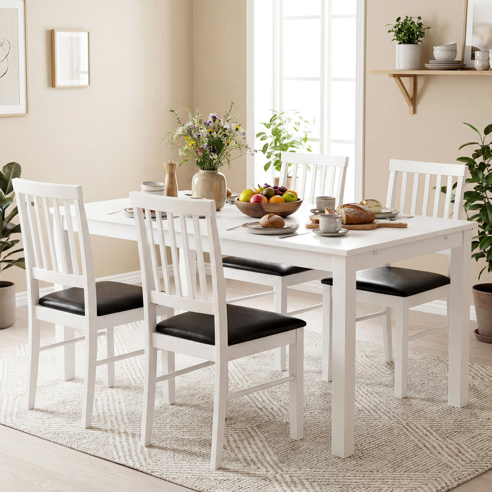 Front view of a white dining chair with breathable hollowed design and supportive padding for relaxed dining.