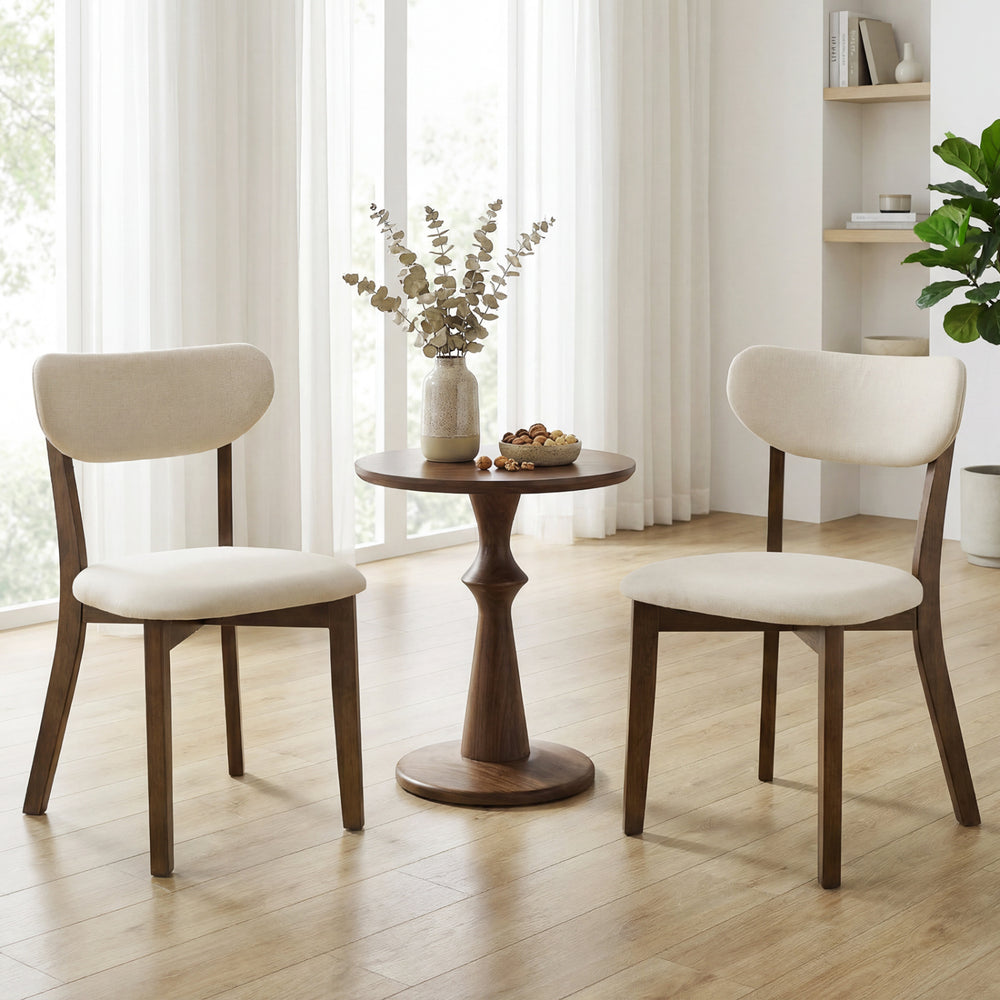 Two dining chairs with solid rubber wood frames and linen fabric covers, perfect for dining rooms and kitchens.