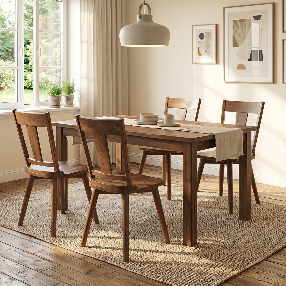 Set of four walnut dining chairs featuring solid wood backrests and ergonomic design for comfortable dining experiences.