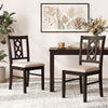 Set of 2 brown rubber wood dining chairs with hollowed backrest and faux linen upholstery for comfortable seating.