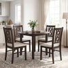 Brown rubber wood dining chairs with hollowed backrest and faux linen upholstery, perfect for a stylish dining room.