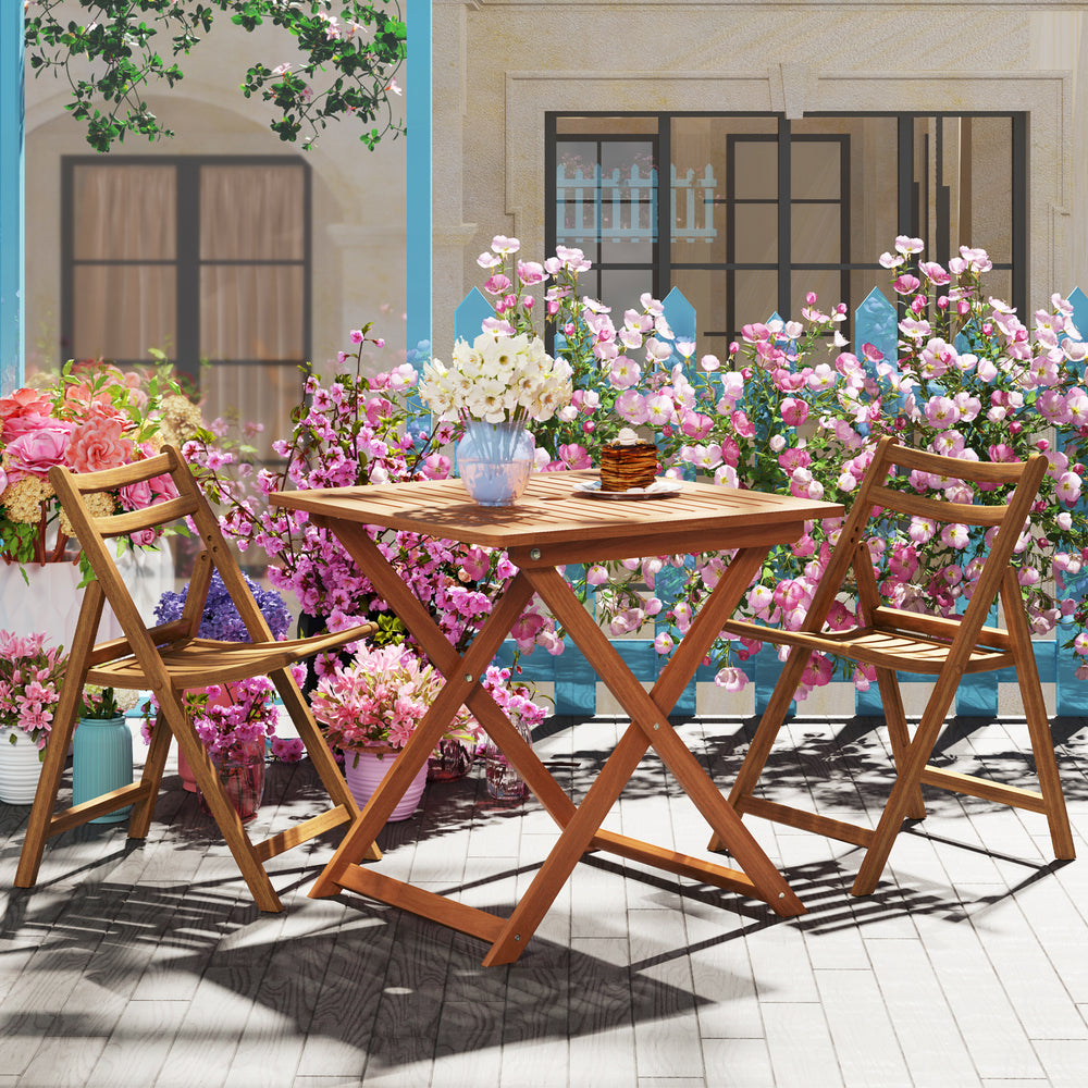 Teak-finished 29.5-inch patio dining table with umbrella hole, ideal for backyard and poolside relaxation.