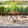 Teak-finished 29.5-inch patio dining table with umbrella hole, ideal for backyard or poolside relaxation.