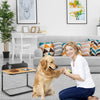 Dog bowl stand with bamboo tabletop and stainless steel bowls, designed for comfort and stability for dogs.