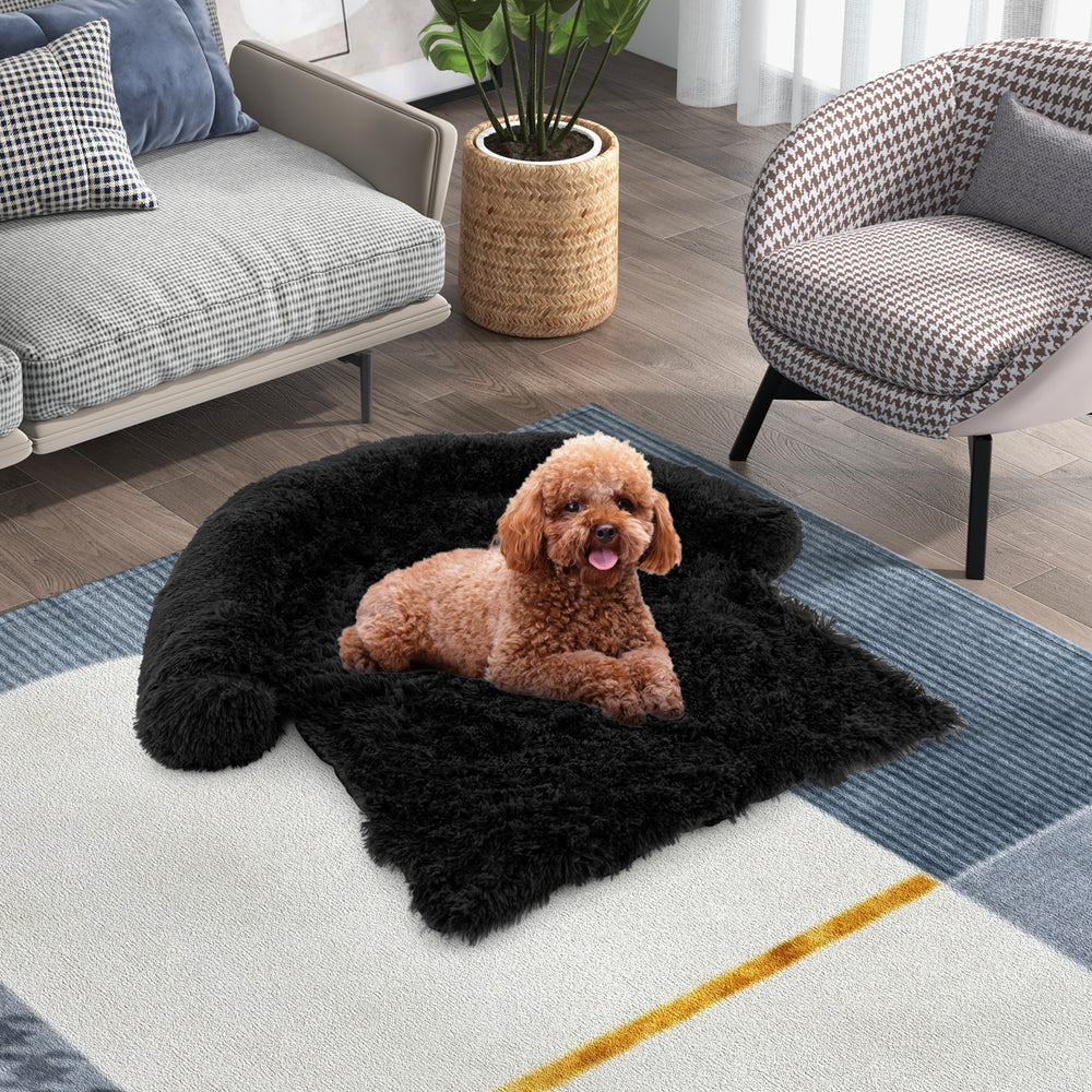 Plush calming dog couch bed with anti-slip bottom, featuring long plush fabric for comfort and a removable bolster.