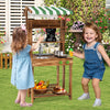 Double-sided mud kitchen with canopy and chalkboard, made of solid wood, perfect for imaginative play for kids 3+.