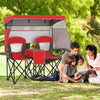 Double beach chair in red with adjustable canopy, side shades, and central cooler bag for outdoor relaxation.