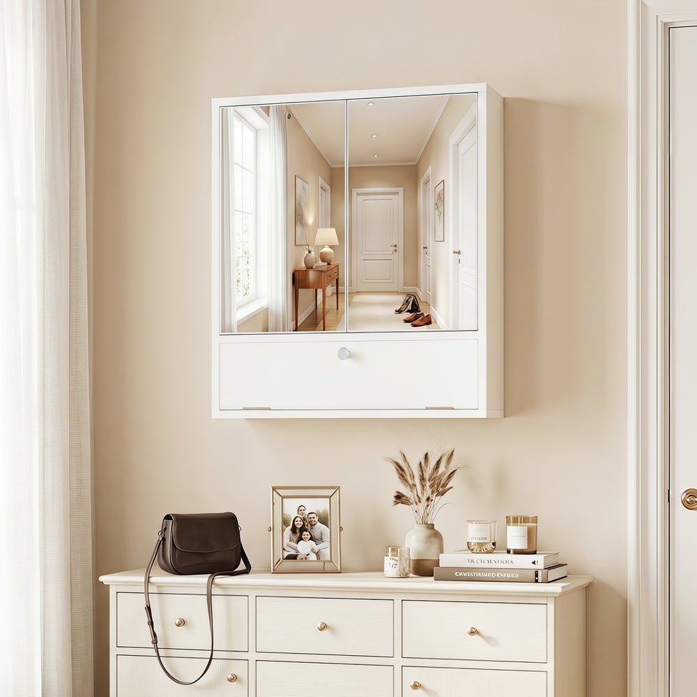Wall-mounted double door mirrored medicine cabinet in white with adjustable shelves for organized bathroom storage.