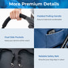 Padded pulling handle and dual side pockets on the blue double pet stroller for convenient travel and easy access.