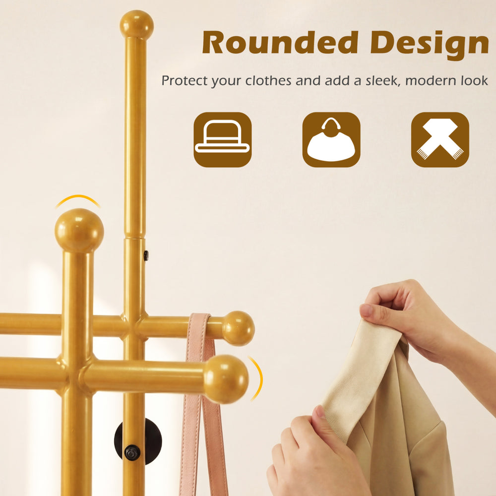 Double rods garment rack in gold with rounded design, featuring hooks for coats and a bottom shelf for shoes.