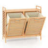 Double tilt-out laundry hamper with two removable bins, made from natural bamboo, ideal for laundry rooms and bathrooms.