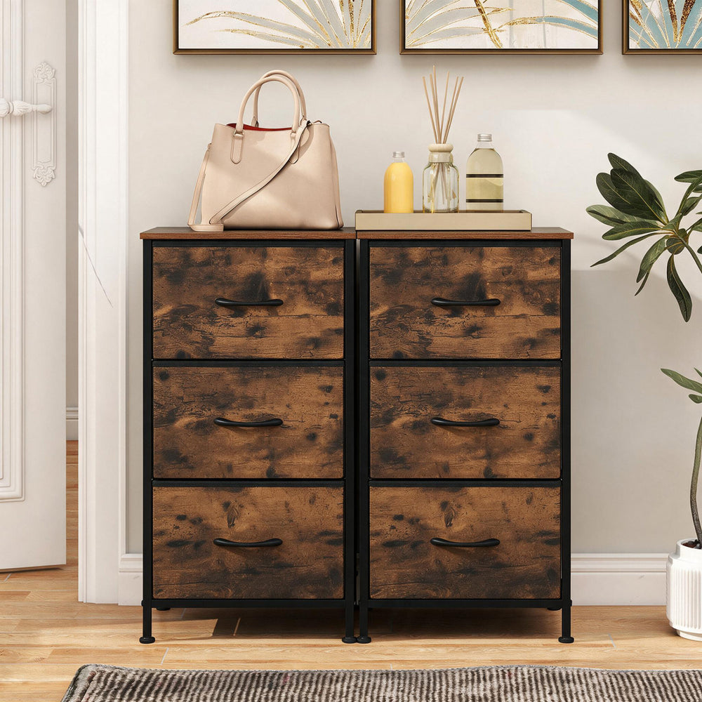 Dresser nightstand with roomy fabric drawers and a sturdy metal frame, ideal for bedroom storage and organization.