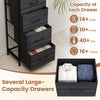 Dresser nightstand with four roomy charcoal black fabric drawers, ideal for organizing shirts, pants, and ties.