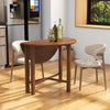 Walnut dual drop leaf dining table for small spaces, accommodating 2-4 people, with a foldable design and sturdy frame.