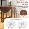 Dual drop leaf dining table in walnut finish, foldable design for small spaces, accommodating 2-4 people.