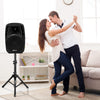 Couple dancing near a Dual 10 Inch 1600W Powered Mic Speaker with Bluetooth, ideal for indoor home use or outdoor.