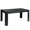 Black dining table with a large surface for six, designed for compact living and easy cleaning.