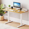 Height adjustable electric standing desk frame in white with LED display, perfect for ergonomic workspace setups.